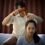 Experience deep relaxation with a traditional Thai wooden tool massage in Chiang Mai spa